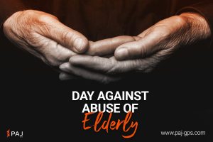 A pair of hands, one placed on top of the other to support day against abuse of elderly.