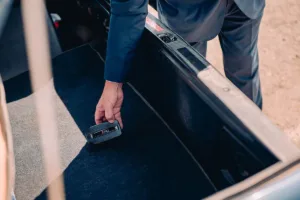 a man Found and removing GPS Trackers