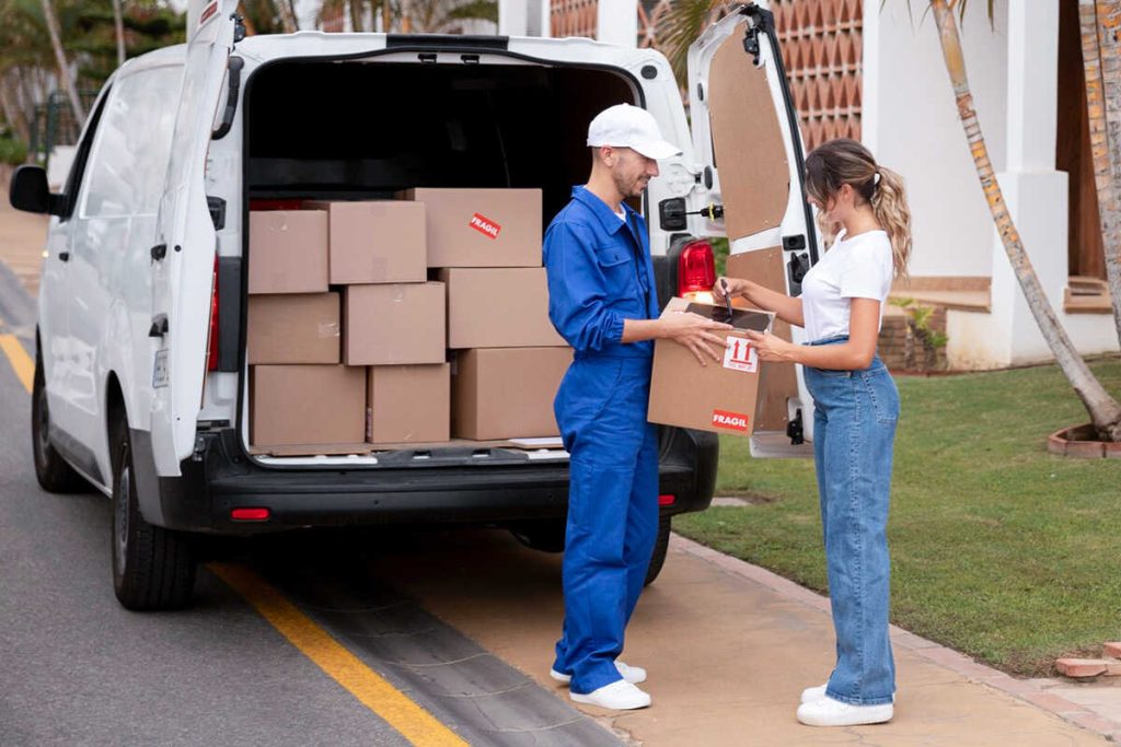 a fleet driver giving package to customer GPS Fleet Tracking Improves Customer Service