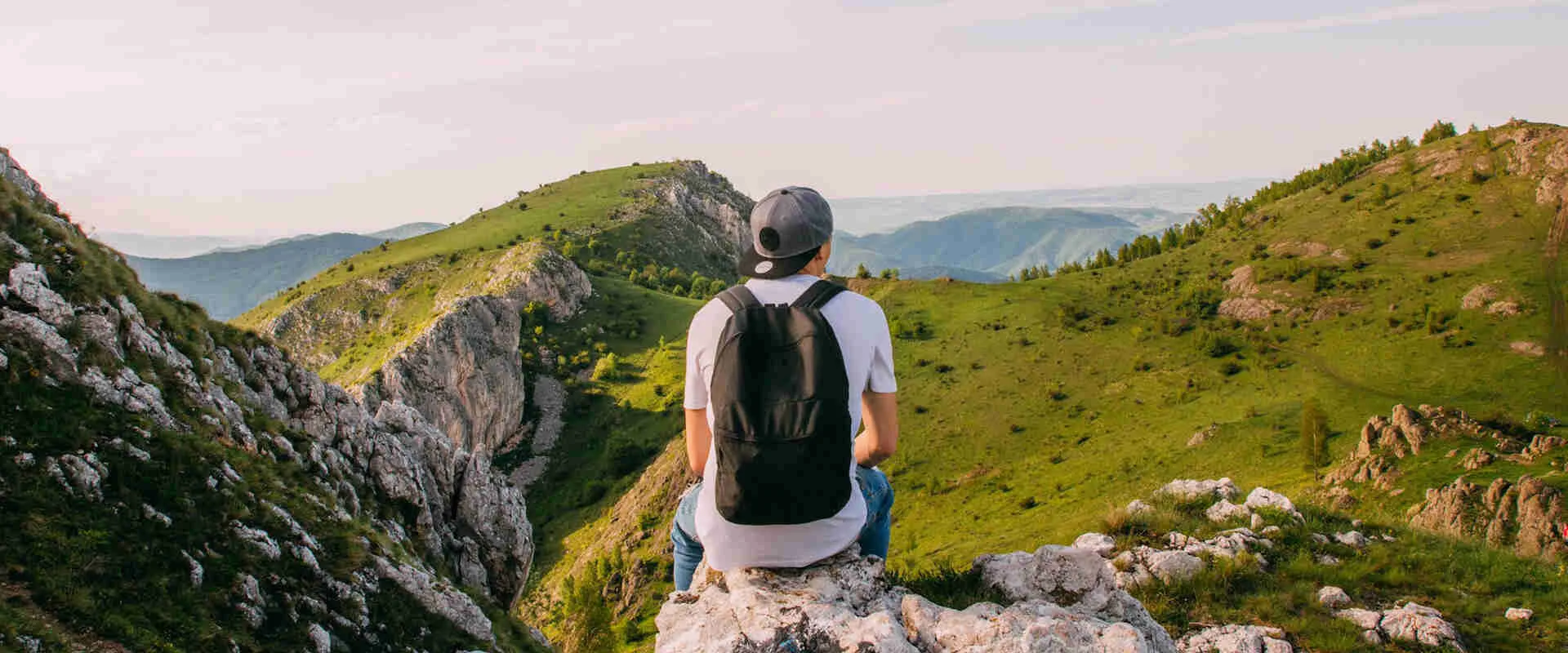 A man sitting alone in mountain
