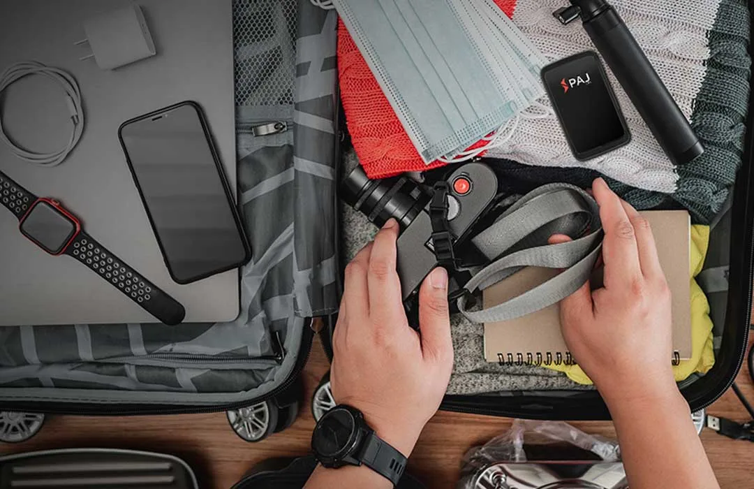 asset tracker placed inside a suitcase
