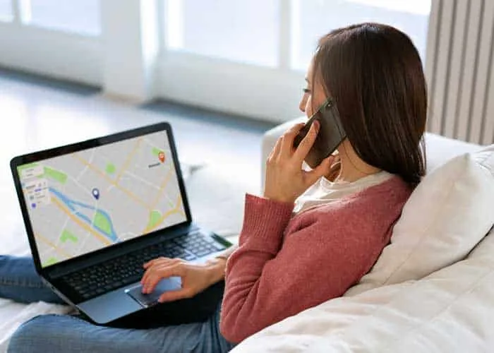 a women looking at details of her gps renting business vehicles