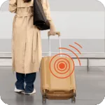 a women carrying a luggage which has luggage GPS tracker in it