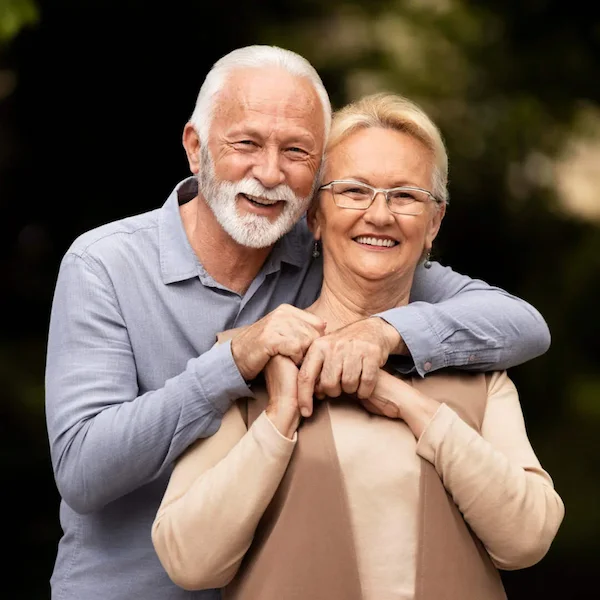 Elderly couples posing together